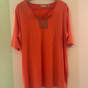 Orange top with goldish detail